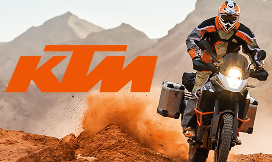 Imagem de ilustração do Projeto de ReDesign da KTM, onde é mostrado o logo a frente de uma moto em um deserto.